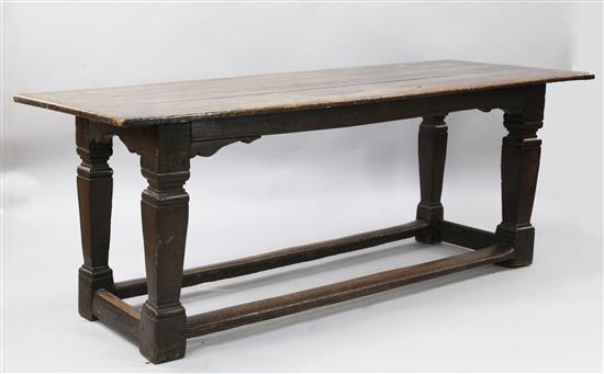 A 17th century style oak refectory table, W.2ft 6in. L.7ft H.2ft 10in.